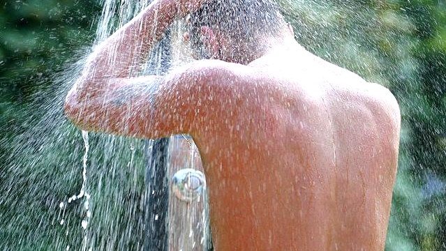 man in shower